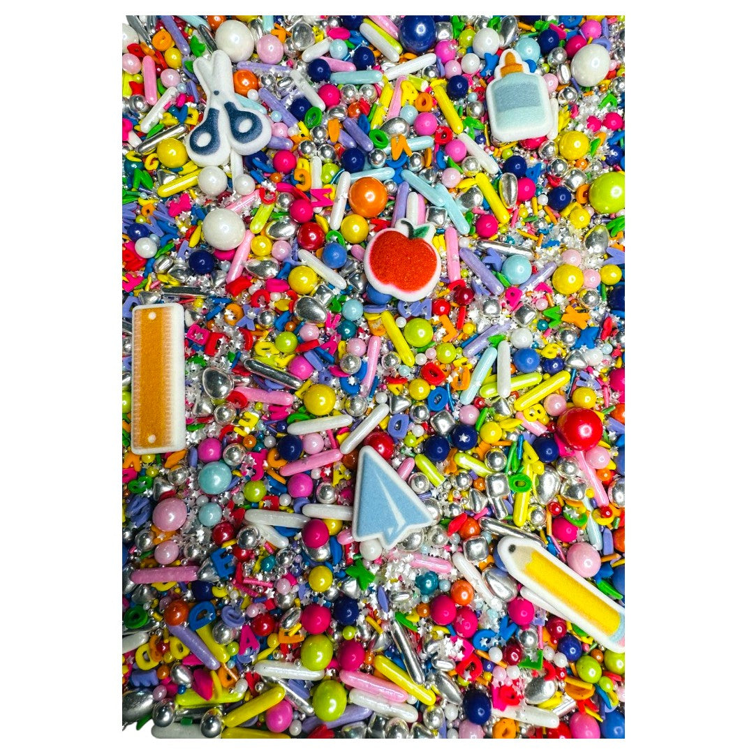 Sprinkles dia del maestro con figuras icing