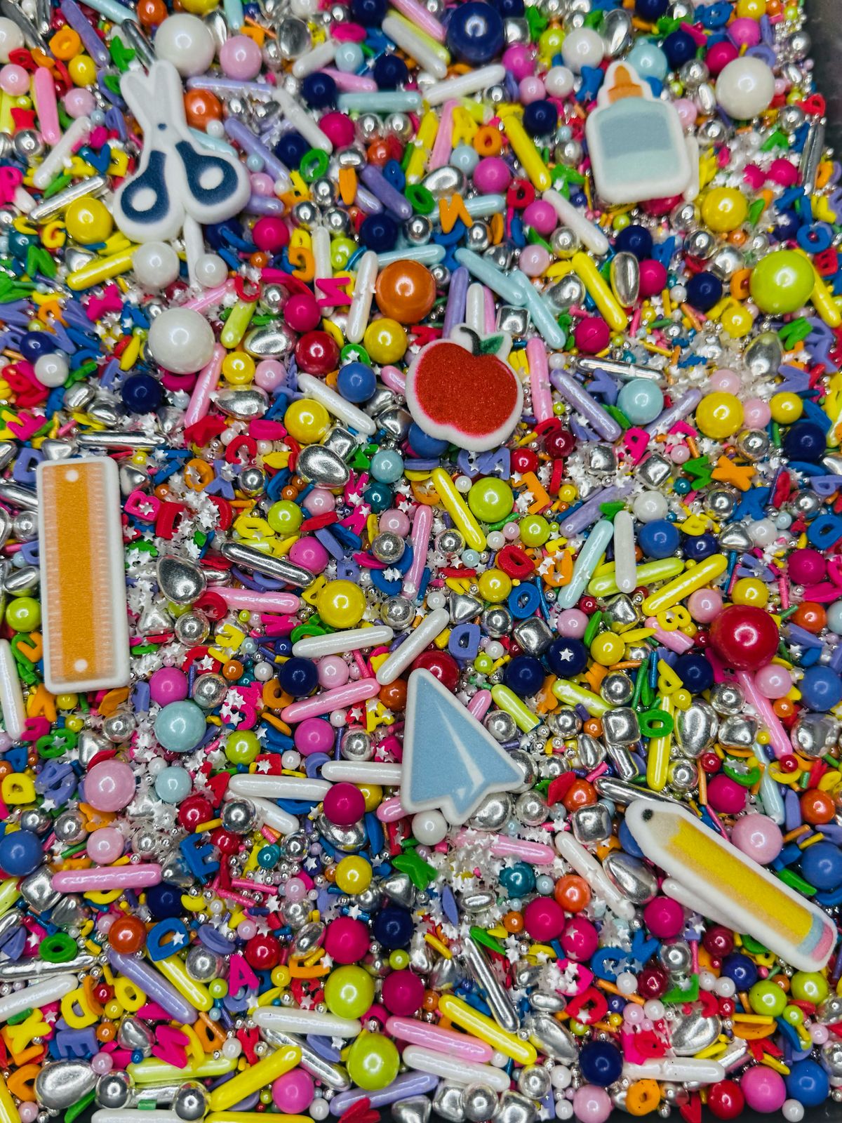 Sprinkles dia del maestro con figuras icing