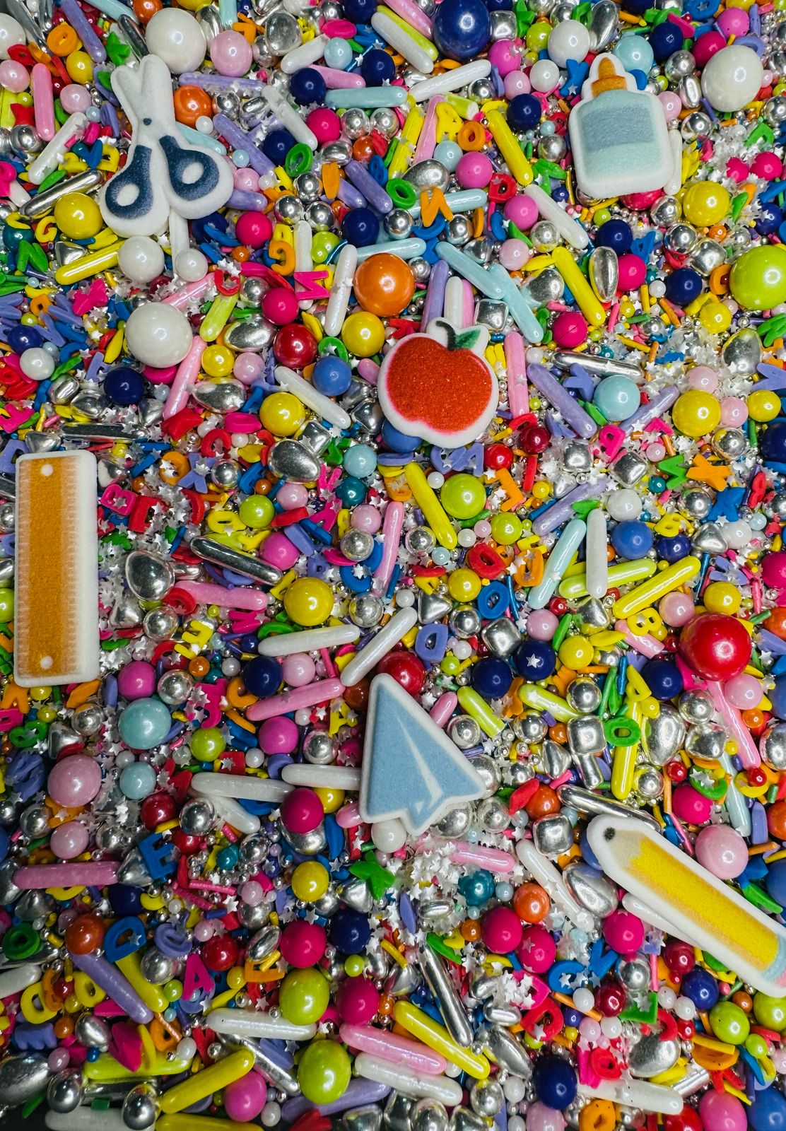 Sprinkles dia del maestro con figuras icing